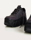 Reflektierende Sneaker mit Plateausohle
